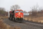 CN 3886 nears County Road B as it comes around the curve with X342